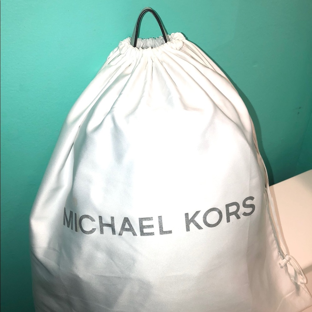 Micheal Kors two tone blue backpack